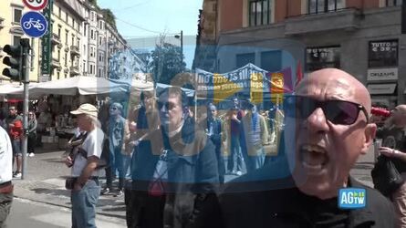 Milano patrioti passano davanti ai manifestanti di sinistra urla e insulti