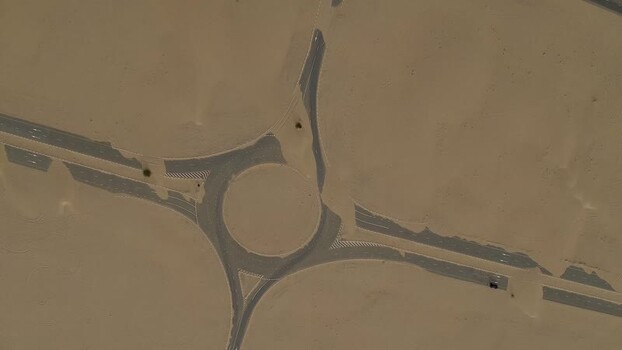 Aerial view of a desert road roundabout United Arab Emirates.