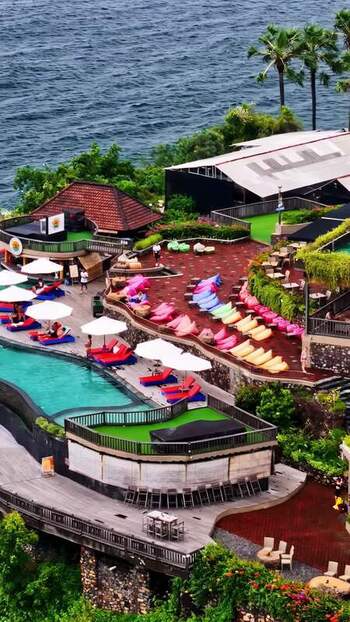 Aerial view of a beach club resort in Bali Indonesia.