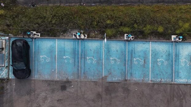 Aerial view of an electric vehicle charging station in Portugal.