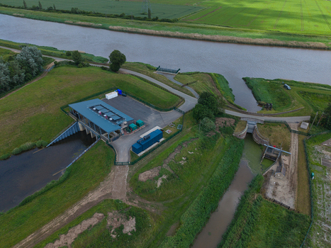 Aerial view of the Islington Pumping Station with its modern facility drainage channels and green embankments in King s Lynn England United Kingdom.