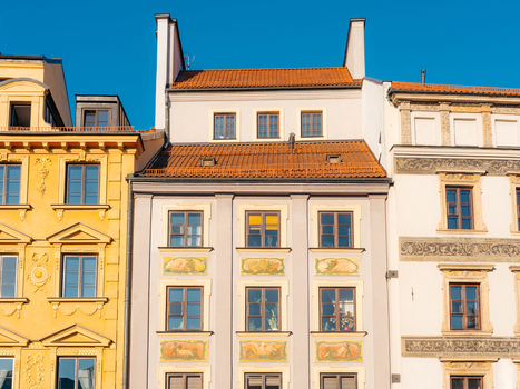 View of colorful historic buildings in Warsaw Old Town with ornate facades and tiled roofs in Warsaw Masovian Voivodeship Poland. View of colorful historic buildings in Warsaw Old Town with ornate facades and tiled roofs in Warsaw Masovian Voivodeship Poland.