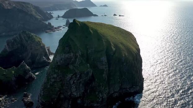 Aerial view of Tormore Island sea stack Ireland.