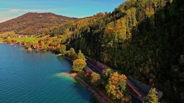 Aerial view of Attersee lake and coastal road Austria.