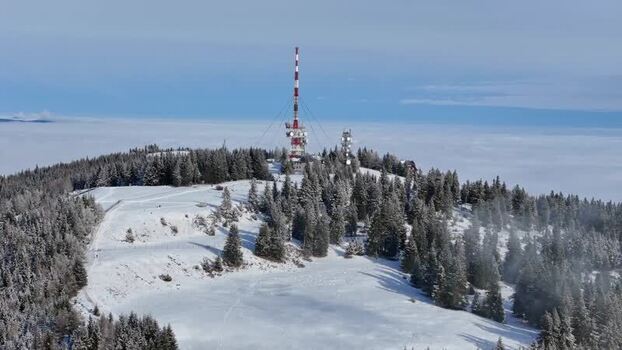 Aerial view of Schockl transmitter and snowy peak Austria. Aerial view of Schockl transmitter and snowy peak Austria.