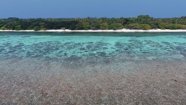 Aerial view of tropical island coastline in Vaikaradhoo Maldives. Aerial view of tropical island coastline in Vaikaradhoo Maldives.