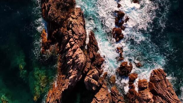 Aerial view of the rugged red granite cliffs and turquoise sea Italy. Aerial view of the rugged red granite cliffs and turquoise sea Italy.