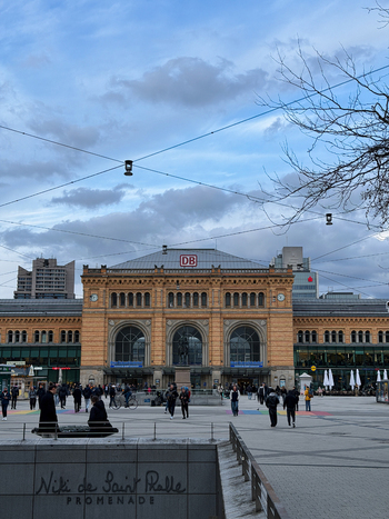 Hanover Germany 29 March 2026 View of Hanover Central Station with its historic brick facade bustling square and commuters walking in the foreground.