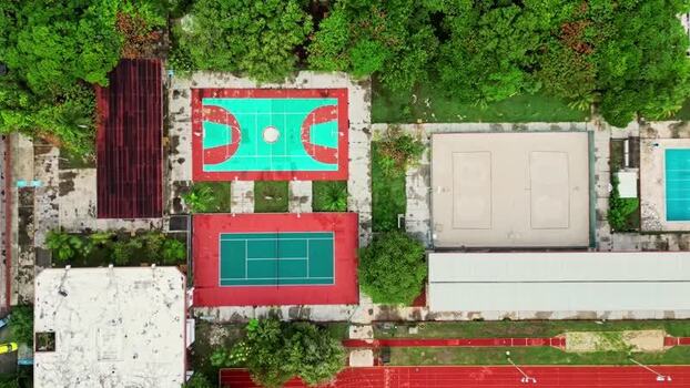 Aerial view of colorful sports courts and green trees Mexico. Aerial view of colorful sports courts and green trees Mexico.