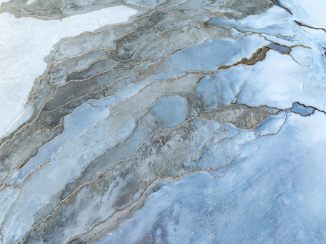 Aerial view of Reykjanes geothermal landscape with intricate mineral deposits and volcanic textures in Grindavikurbaer Iceland. Aerial view of Reykjanes geothermal landscape with intricate mineral deposits and volcanic textures in Grindavikurbaer Iceland.