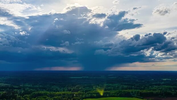 Aerial view of storm clouds over the forest in Latvia. Aerial view of storm clouds over the forest in Latvia.