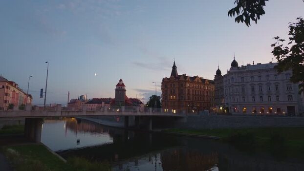 View of historic architecture along the Morava River in Czechia.