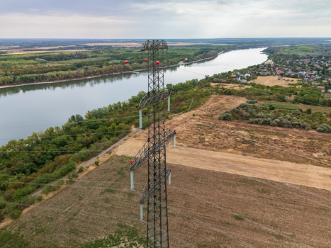 Aerial view of power lines and towers by the Danube near Ercsi Hungary Aerial view of power lines and towers by the Danube near Ercsi Hungary