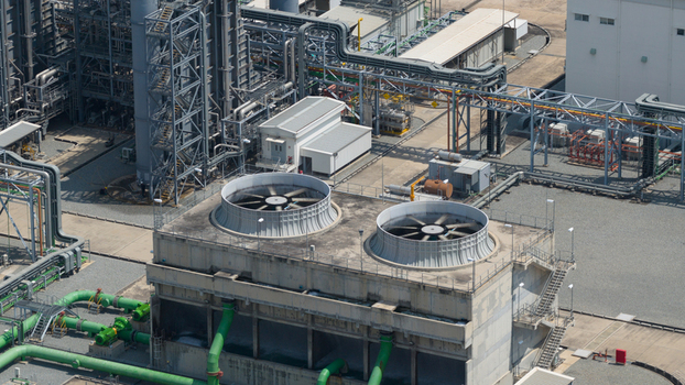 Aerial view of Amata B.Grimm Power Rayong 3 Ltd. featuring cooling towers and industrial piping systems in Tambon Mapyangphon Chang Wat Rayong Thailand. Aerial view of Amata B.Grimm Power Rayong 3 Ltd. featuring cooling towers and industrial piping systems in Tambon Mapyangphon Chang Wat Rayong Thailand.