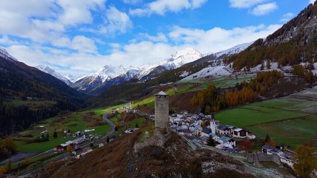 Aerial view of Ardez castle tower and village Switzerland.