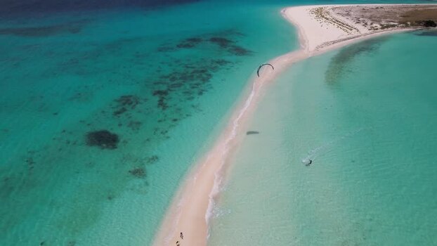 Aerial view of kitesurfer in Los Roques archipelago Venezuela.