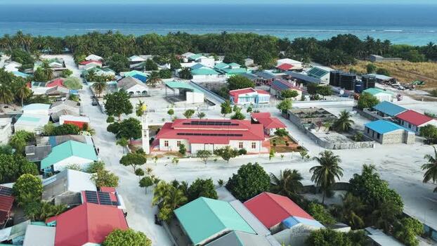 Aerial view of the coastal village of Makunudhoo Maldives. Aerial view of the coastal village of Makunudhoo Maldives.