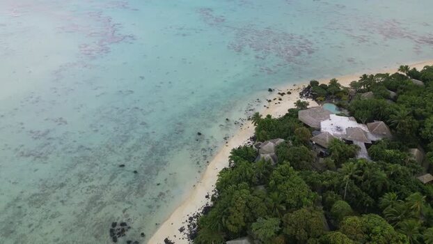 Aerial view of a tropical resort and coral reef Cook Islands. Aerial view of a tropical resort and coral reef Cook Islands.