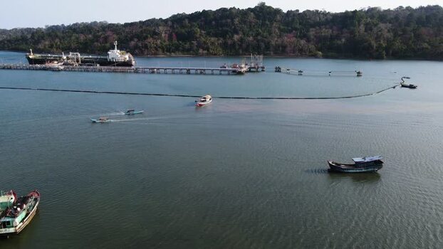 Aerial view of harbor with tanker and fishing boats Indonesia. Aerial view of harbor with tanker and fishing boats Indonesia.