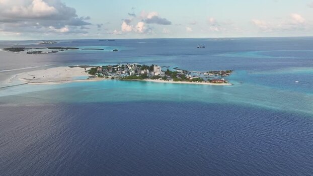 Aerial view of Gulhi island and turquoise waters Maldives. Aerial view of Gulhi island and turquoise waters Maldives.