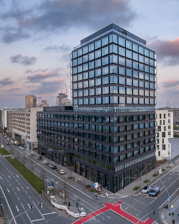 Hamburg Germany 24 April 2026 Aerial view of the modern glass facade of the Garbe office building on Versmannstrasse under a cloudy sky. Hamburg Germany 24 April 2026 Aerial view of the modern glass facade of the Garbe office building on Versmannstrasse under a cloudy sky.