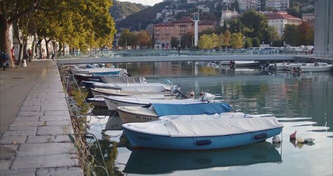 View of small boats moored at the Rijeka waterfront Croatia. View of small boats moored at the Rijeka waterfront Croatia.