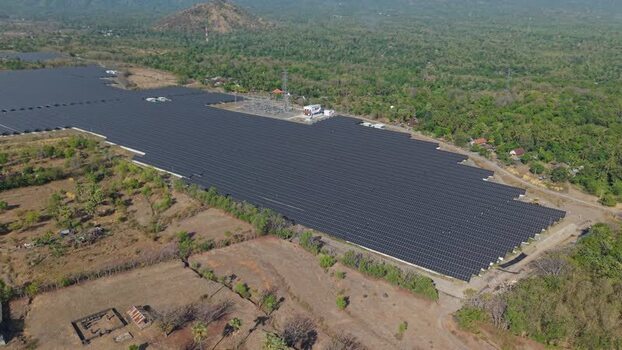 Aerial view of PLTS Bali Timur solar farm in Indonesia. Aerial view of PLTS Bali Timur solar farm in Indonesia.