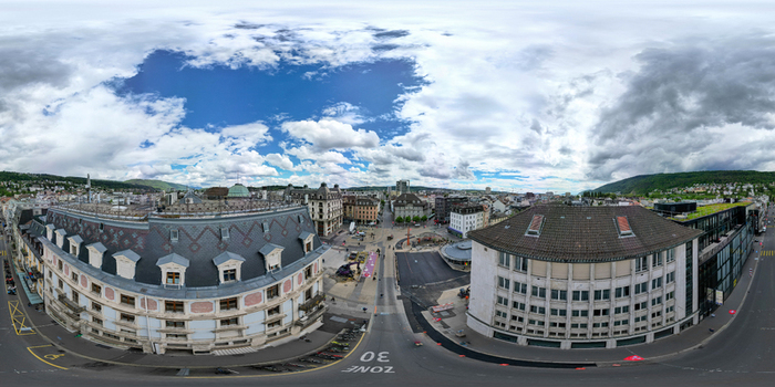Aerial view of the historic city center featuring ornate rooftops urban streets and surrounding hills under a cloudy sky in Biel Bienne Canton of Bern Switzerland. Aerial view of the historic city center featuring ornate rooftops urban streets and surrounding hills under a cloudy sky in Biel Bienne Canton of Bern Switzerland.