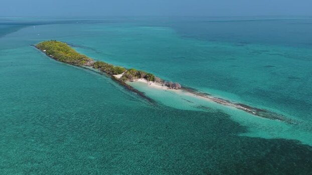 Aerial view of a tropical island and turquoise sea Maldives. Aerial view of a tropical island and turquoise sea Maldives.
