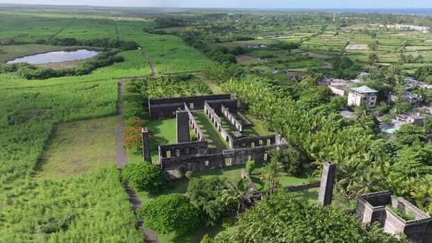 Aerial view of Belle Mare Sugar Mill ruins Mauritius.