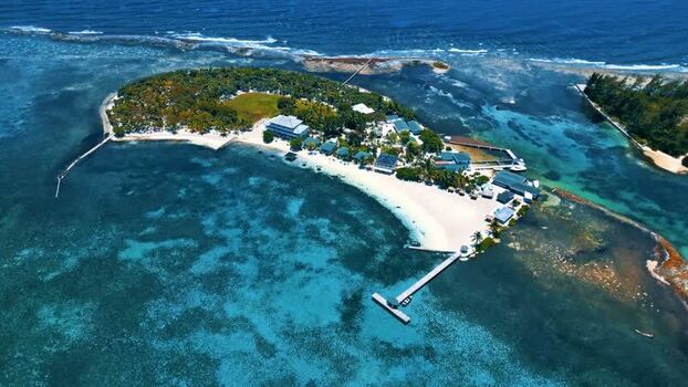 Aerial view of Guanaja island resort and coral reefs Honduras. Aerial view of Guanaja island resort and coral reefs Honduras.