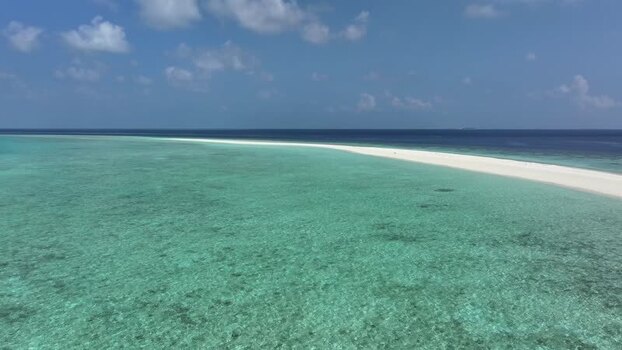 Aerial view of a white sandbank and turquoise water Maldives. Aerial view of a white sandbank and turquoise water Maldives.