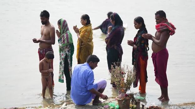 View of people performing a religious ritual in Rajshahi Bangladesh. View of people performing a religious ritual in Rajshahi Bangladesh.
