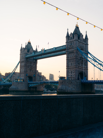 London United Kingdom 20 June 2025 View of the majestic Tower Bridge piercing the pastel dawn sky its intricate stonework a testament to time reflected in the serene waters below. London United Kingdom 20 June 2025 View of the majestic Tower Bridge piercing the pastel dawn sky its intricate stonework a testament to time reflected in the serene waters below.
