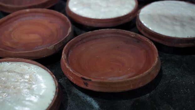 View of traditional curd in clay pots in Bogura Bangladesh. View of traditional curd in clay pots in Bogura Bangladesh.
