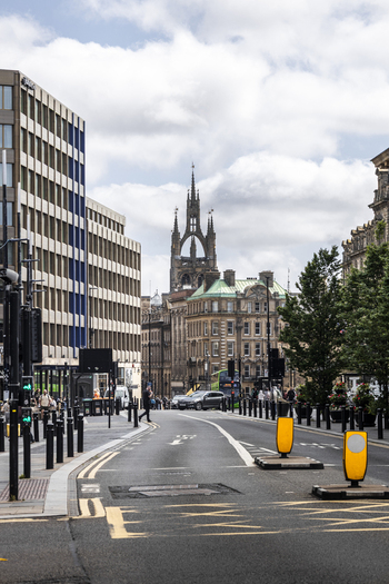 Newcastle upon Tyne England United Kingdom 13 July 2026 View of Grey s Monument rising above the urban streetscape featuring historic architecture traffic and pedestrians. Newcastle upon Tyne England United Kingdom 13 July 2026 View of Grey s Monument rising above the urban streetscape featuring historic architecture traffic and pedestrians.