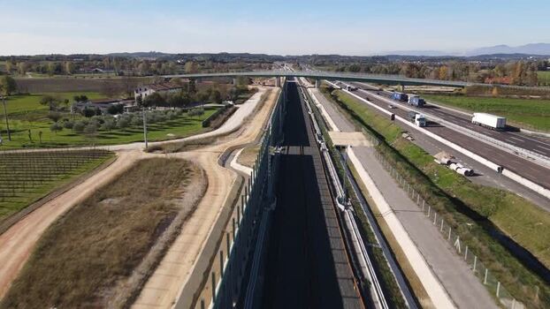 Aerial view of highway infrastructure and bridge Italy.