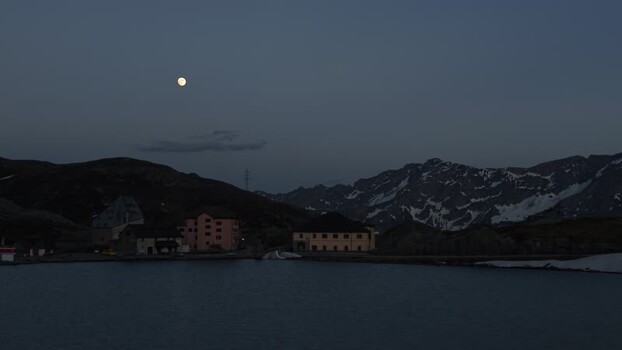 Aerial view of Hotel Passo San Gottardo under full moon Switzerland. Aerial view of Hotel Passo San Gottardo under full moon Switzerland.