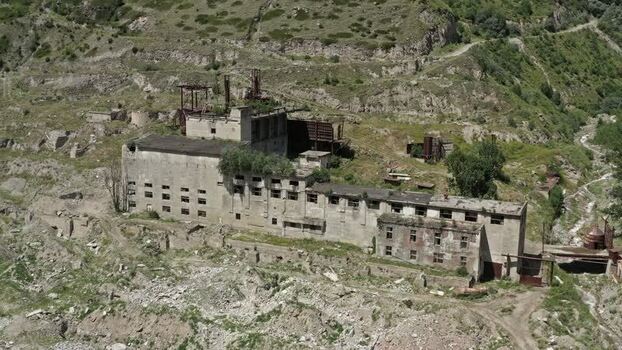 Aerial view of abandoned factory in Caucasus Mountains Russia.