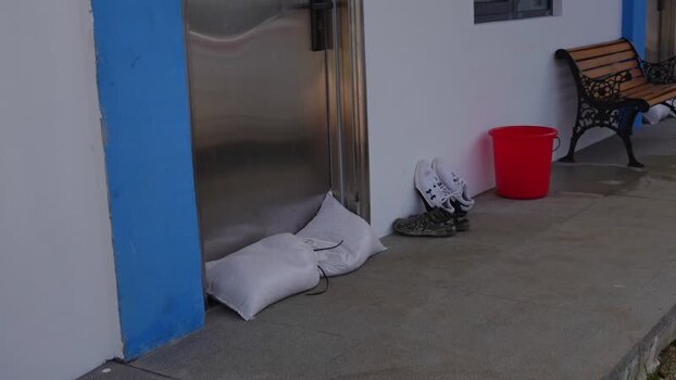View of sandbags against a door in San Jose Northern Mariana Islands. View of sandbags against a door in San Jose Northern Mariana Islands.
