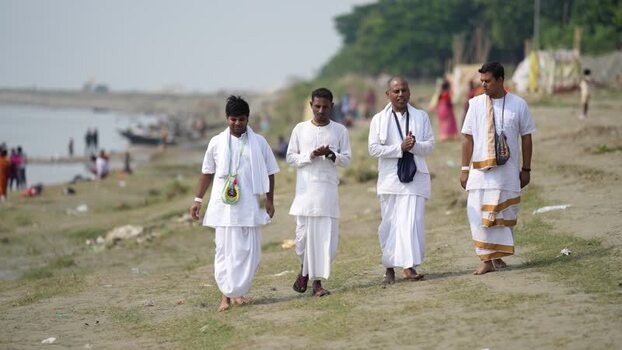 View of men in traditional white attire in Godagari Upazila Bangladesh. View of men in traditional white attire in Godagari Upazila Bangladesh.