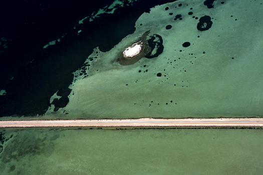 Aerial view of industrial salt patterns and sand deposits in the shallow turquoise waters of Useless Loop near Kalbarri Western Australia Australia. Aerial view of industrial salt patterns and sand deposits in the shallow turquoise waters of Useless Loop near Kalbarri Western Australia Australia.