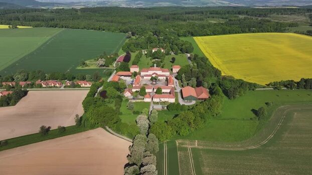 Aerial view of a historic estate and yellow fields Germany. Aerial view of a historic estate and yellow fields Germany.