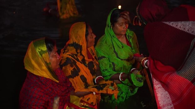 View of women performing a religious ritual in Bogura Bangladesh. View of women performing a religious ritual in Bogura Bangladesh.