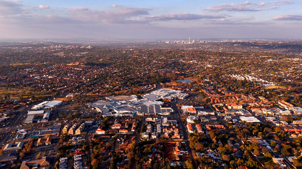 Aerial view of Cresta Shopping Centre and Northcliff suburbs with the Johannesburg CBD skyline in the distance Johannesburg Gauteng South Africa. Aerial view of Cresta Shopping Centre and Northcliff suburbs with the Johannesburg CBD skyline in the distance Johannesburg Gauteng South Africa.