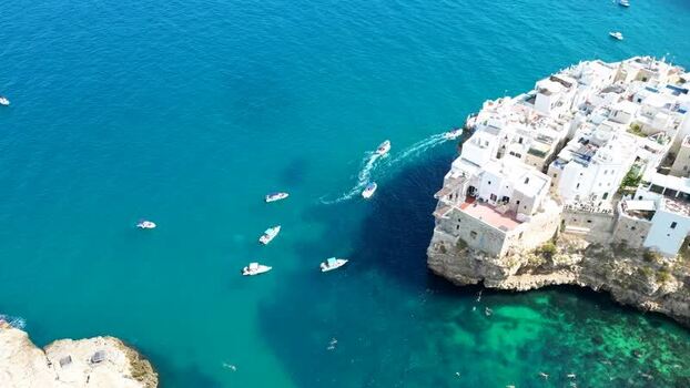 Aerial view of Polignano a Mare coastal cliffs Italy.
