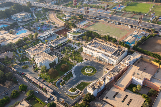 View of modern buildings with lush greenery a circular driveway and an elevated highway cutting through the skyline Zamalek Cairo Governorate Egypt. View of modern buildings with lush greenery a circular driveway and an elevated highway cutting through the skyline Zamalek Cairo Governorate Egypt.
