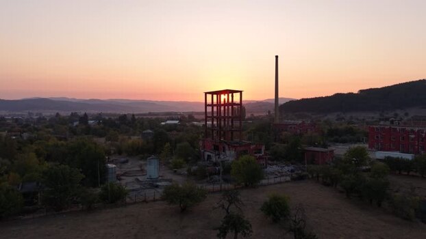Aerial view of abandoned factory at sunset Bulgaria.