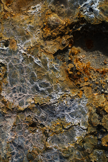 View of earth s raw canvas where ochre and rust dance with veins of silver a silent symphony etched in stone Hrunamannahreppur Hrunamannahreppur Iceland.