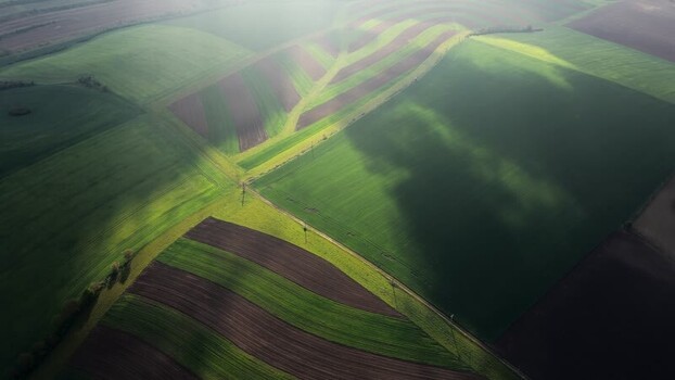Aerial view of rolling agricultural fields in Bohumilice Czechia.